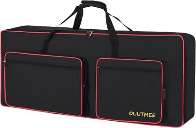 un grand sac noir avec des bordures et des anses rouges
