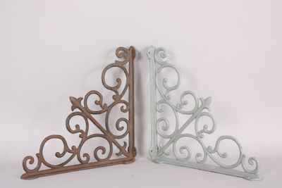 two decorative brackets are shown on a white background