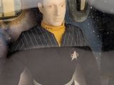 a star trek action figure in a display case