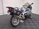 a motorcycle that is parked on the floor in a room