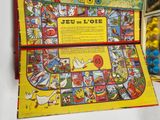a game board with a picture of a bird on it