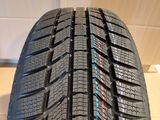 a close up of a tire on a white floor