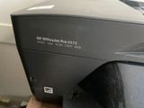 a printer that is sitting on top of a table
