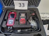 a case that has a red and black device in it