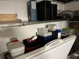 a refrigerator that has many containers and containers in it