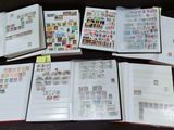 a lot of stamps on the pages of a book