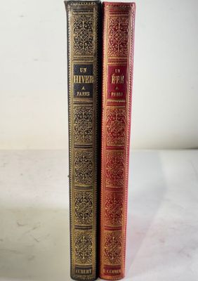 two books sitting on top of each other on a table