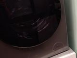 a washer and a dryer in a small room