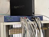 a black box with wires on top of it in a room