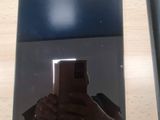 une personne se prenant en photo dans un miroir