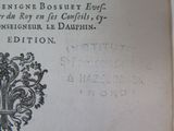an old book with a picture of a tree on it
