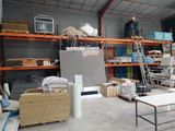 a large room with a lot of items on the shelves