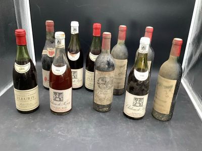 several bottles of wine are lined up in a row on a table