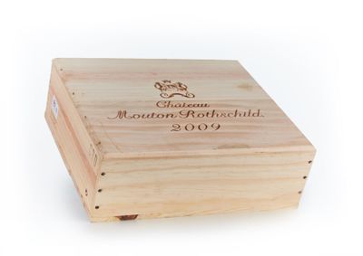 the wooden box is holding a bottle of wine and a bottle of wine