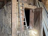 a ladder leaning up against a wall in a building