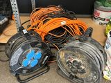 a pile of wires and other electrical equipment on the floor