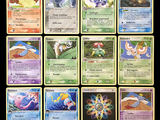 beaucoup de cartes pokemon sur la table