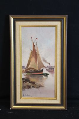 painting of a sailboat on a body of water in a gold frame