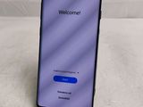 a close up of the back of a samsung galaxy note 9 with a welcome screen
