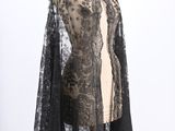 a black lace cape on a mannequin mannequin mannequin mannequin mannequin mannequin mannequin mannequin manne