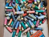 an open box filled with lots of different types of batteries