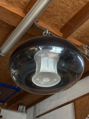 a light that is hanging from the ceiling in the room