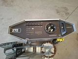 a machine that is sitting on the ground in the garage