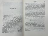 an open book that has a picture of a cat on it