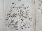 two pages of a book with a drawing of a dragon on it