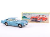 an image of a blue toy car next to a box of toys