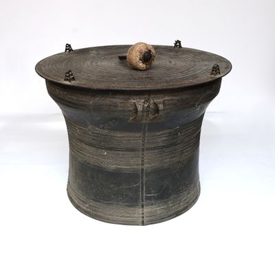 a wooden box with a skull on top of it