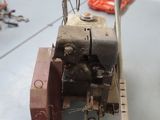 a small toy tractor that is sitting on a table