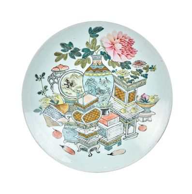 a plate with a picture of a teapot and other things on it