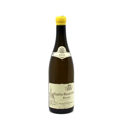 a bottle of wine that is sitting on a table
