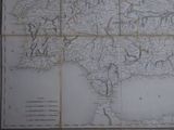 an old map of the country of england on the wall
