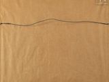 a brown cardboard box with a string attached to it