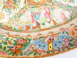 a colorful plate with an elephant on it on a table