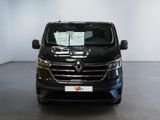 the front of a black van parked inside of a building