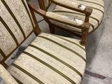 two chairs that are sitting in a room