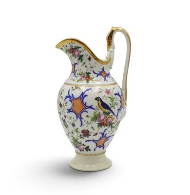 a white and blue vase with a bird on it