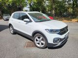 the volkswagen t - cross is parked in a parking lot