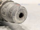 a close up of a drill with a hole in it