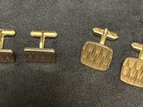 three pairs of gold cufflinks and a pair of silver cufflinks