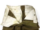 a close up of a pair of pants on a white surface