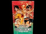 a box of one piece card game on a black background