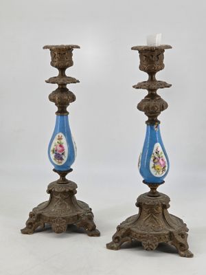 pair of antique blue and gold candlesticks with floral designs