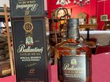 the bottle of ballantia 12 years old is next to the box on the table