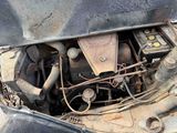an old car engine with a lot of rust on it