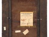 an old picture of a wooden frame with a piece of paper on it
