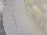 a close up of a plate with a cake on it